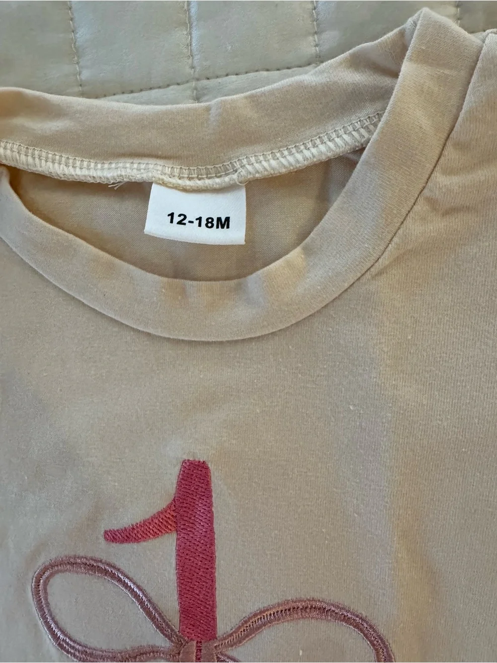 Beige One-Piece Baby Romper with Pink Number Graphic Happy Birthday 